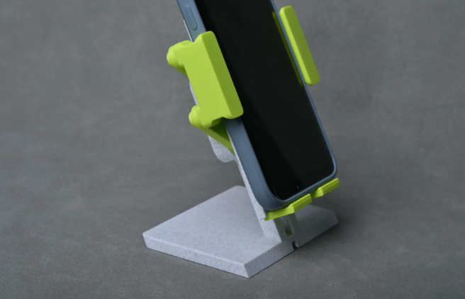 Gravity self-clamping mobile phone holder