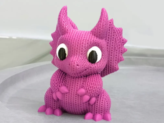 Adorable hand-woven dinosaur
