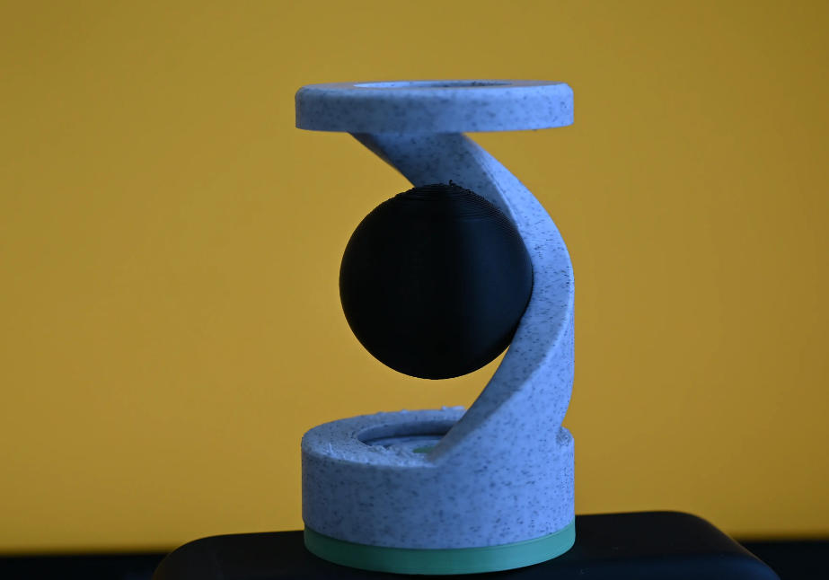 Decompress and rotate the suspended ball
