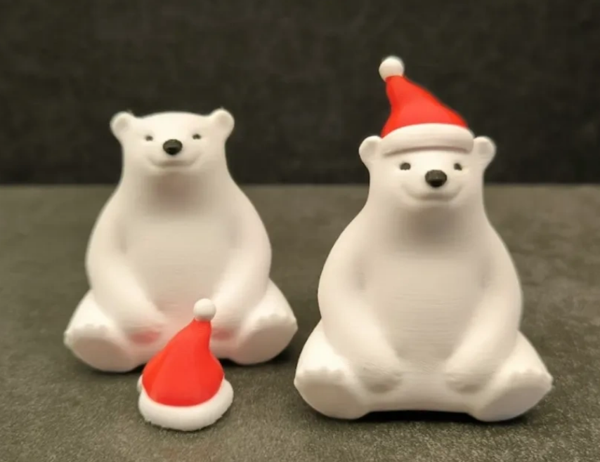 Polar bear wearing a Santa hat